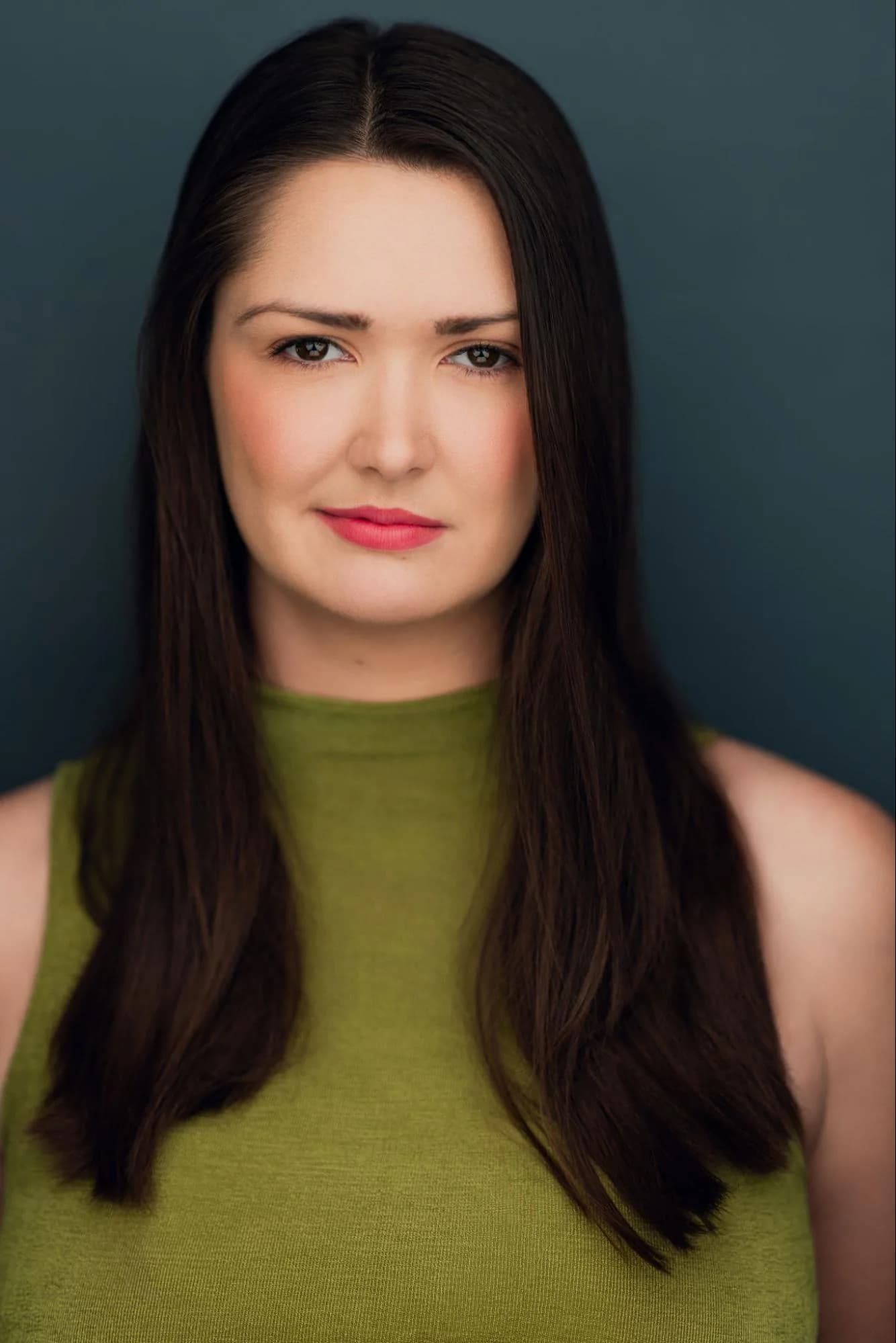 Veronica Murphy in an olive green top